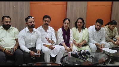 Opposition councillors along with former MC mayor during a press conference in Chandigarh on Monday. (HT Photo)