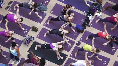 People-practice-yoga-on-the-morning-of-the-summer-solstice-in-New-York-s-Times-Square-Reuters-Shannon-Stapleton
