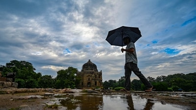 New Delhi, India - Oct. 6, 2025: Tourists seen during light rains at Lodhi Garden in New Delhi, India, on Monday, October 6, 2025.  (Photo by Sanchit Khanna/ Hindustan Times) (Hindustan Times)