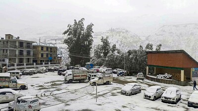 Vehicles covered in fresh snowfall, in Keylong, on Monday. (PTI) Vehicles covered in fresh snowfall, in Keylong, on Monday. (PTI)