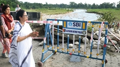 West Bengal CM Mamata Banerjee conducts an inspection of the flood-affected Kalikhola Bridge at Nagrakata, in Jalpaiguri on Monday (@AITCofficial X)