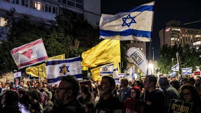 Demonstrators gathered for an antigovernment protest outside the Israeli prime minister's residence in Jerusalem on Saturday. (Agency) Demonstrators gathered for an antigovernment protest outside the Israeli prime minister's residence in Jerusalem on Saturday. (Agency)