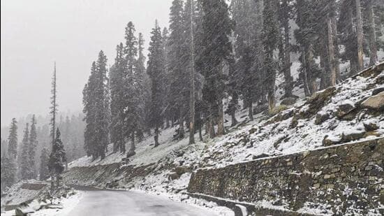 Sinthan Top covered in snow after a fresh spell in Anantnag district of Jammu and Kashmir on Monday. (PTI Photo)