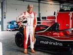 Ajith Kumar with the Formula E car made by Mahindra in Spain. 