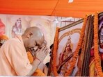 Uttar Pradesh chief minister Yogi Adityanath offering prayers at an event in Varanasi on Monday. (ANI PHOTO)