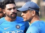 Mohammed Siraj with MS Dhoni Mohammed Siraj with MS Dhoni