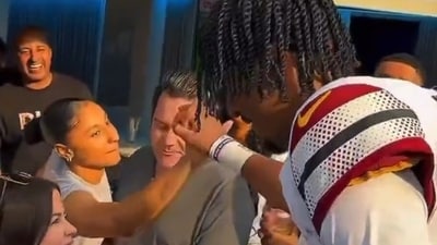 Jayden Daniels and Juju Watson had a romantic handshake. Jayden Daniels and Juju Watson had a romantic handshake.