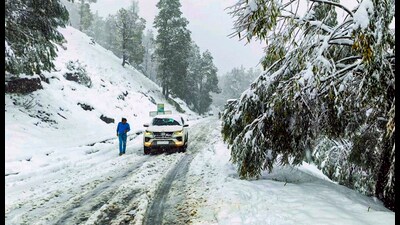 A road covered in white sheet after snowfall, in Sissu area of Lahaul-Spiti valley, in Himachal on Tuesday. (PTI) A road covered in white sheet after snowfall, in Sissu area of Lahaul-Spiti valley, in Himachal on Tuesday. (PTI)