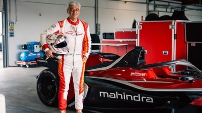 Ajith Kumar with the Formula E car made by Mahindra in Spain. Ajith Kumar with the Formula E car made by Mahindra in Spain.