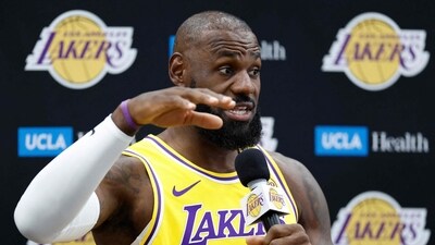 LeBron James #23 of the Los Angeles Lakers speaks with the media (Getty Images via AFP) LeBron James #23 of the Los Angeles Lakers speaks with the media (Getty Images via AFP)