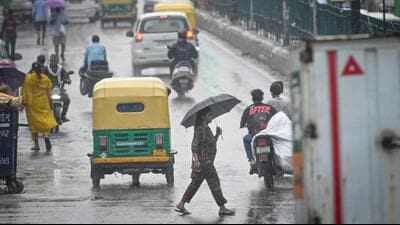 People commute amid light showers near Akshardham temple in New Delhi. (Sanchit Khanna/ HT Photo) People commute amid light showers near Akshardham temple in New Delhi. (Sanchit Khanna/ HT Photo)