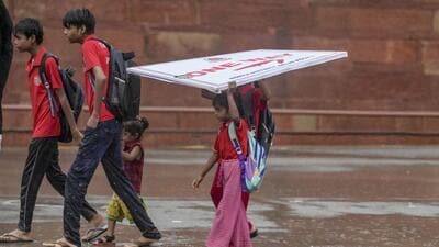 Visitors at the Red Fort during the rainfall on Tuesday evening. (RAJ K RAJ /HT PHOTO) Visitors at the Red Fort during the rainfall on Tuesday evening. (RAJ K RAJ /HT PHOTO)