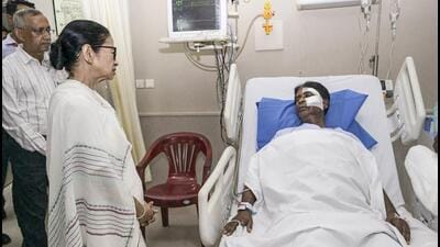 West Bengal chief minister Mamata Banerjee meets BJP MP Khagen Murmu, who is undergoing treatment after being assaulted in Nagarkata, at a private hospital in Siliguri (AITC via PTI) West Bengal chief minister Mamata Banerjee meets BJP MP Khagen Murmu, who is undergoing treatment after being assaulted in Nagarkata, at a private hospital in Siliguri (AITC via PTI)