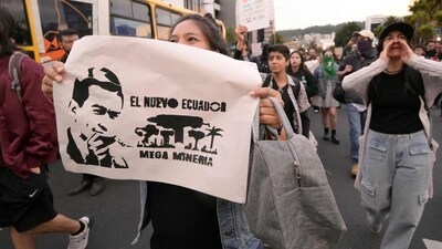 Demonstrators take part in an anti-government protest in Ecuador (AFP)