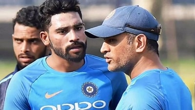 Mohammed Siraj with MS Dhoni Mohammed Siraj with MS Dhoni