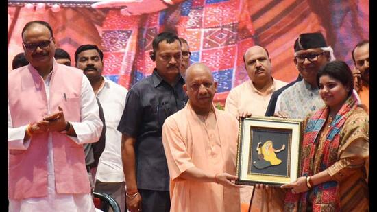 Uttar Pradesh chief minister Yogi Adityanath at an event marking birth anniv of late MLA DP Bora in Lucknow. (HT photo)