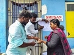 A Tamil Nadu health official sticks a notice outside the Sresan Pharmaceutical factory whose Coldrif cough syrup has been linked to the deaths of 17 children in Madhya Pradesh, in Chennai. (REUTERS) A Tamil Nadu health official sticks a notice outside the Sresan Pharmaceutical factory whose Coldrif cough syrup has been linked to the deaths of 17 children in Madhya Pradesh, in Chennai. (REUTERS)