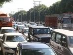 A brief spell of rain on Tuesday once again brought major roads to a standstill, with long traffic snarls reported along Airport Road and Landran Road. Commuters found themselves stuck in slow-moving lines for extended periods as the downpour triggered widespread congestion. (HT File)