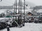 A view of Aru Valley after fresh snowfall, in Pahalgam on Tuesday. (PTI)