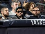 Bad Bunny attends the game between the New York Yankees and the Toronto Blue Jays at Yankee Stadium on October 7. Bad Bunny attends the game between the New York Yankees and the Toronto Blue Jays at Yankee Stadium on October 7.