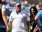 Head coach Bill Belichick of the North Carolina Tar Heels and Jordon Hudson look on prior to the game against the Richmond Spiders 