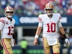Brock Purdy #13 and Mac Jones #10 of the San Francisco 49ers looks on during the third quarter against the Seattle Seahawks Brock Purdy #13 and Mac Jones #10 of the San Francisco 49ers looks on during the third quarter against the Seattle Seahawks