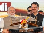 In this image received on Oct. 8, 2025, Prime Minister Narendra Modi with Maharashtra Chief Minister Devendra Fadnavis and Deputy Chief Ministers Ajit Pawar and Eknath Shinde during the inauguration of Phase 1 of the Navi Mumbai International Airport and launch of other development projects, in Navi Mumbai, Maharashtra. (PMO via PTI Photo)