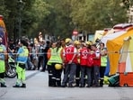 Emergency responders work at the site of a building collapse in central Madrid, Spain, October 7, 2025. 