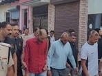 The four suspects seen with their heads shaved during the march on Tuesday evening. (HT) The four suspects seen with their heads shaved during the march on Tuesday evening. (HT)