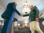 President Donald Trump and Prime Minister Narendra Modi shake hands during a news conference in the East Room of the White House in Feb