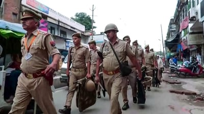 FILE PHOTO: Police personnel conduct a flag march in Kanpur. (ANI Video Grab) (ANI Video Grab) FILE PHOTO: Police personnel conduct a flag march in Kanpur. (ANI Video Grab) (ANI Video Grab)