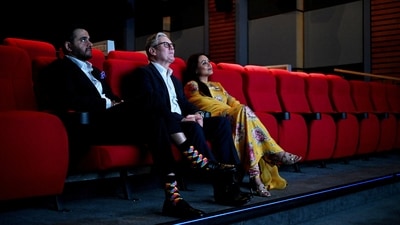 Yash Raj Films CEO Akshaye Widhani, British Prime Minister Keir Starmer and Rani Mukerji watch a screening, during Starmer's visit to Yash Raj Films, in Mumbai, India, October 8, 2025. Leon Neal/Pool via REUTERS (via REUTERS)