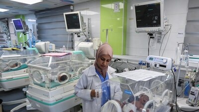 A UN spokesperson described mothers and babies lining the corridor floors of Nasser Hospital in southern Gaza, and said that premature babies were being forced to share oxygen masks and beds. (Reuters)