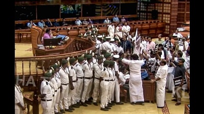 Opposition leaders hold a protest over the Sabarimala gold plating controversy in the Kerala Legislative Assembly in Thiruvananthapuram on Wednesday. (PTI PHOTO) Opposition leaders hold a protest over the Sabarimala gold plating controversy in the Kerala Legislative Assembly in Thiruvananthapuram on Wednesday. (PTI PHOTO)