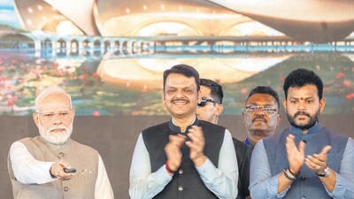 PM Modi inaugurated the first phase of the airport on Wednesday. He was accompanied by chief minister Devendra Fadnavis and civil aviation minister Ram Mohan Naidu. (Satish Bate/ Hindustan Times) PM Modi inaugurated the first phase of the airport on Wednesday. He was accompanied by chief minister Devendra Fadnavis and civil aviation minister Ram Mohan Naidu. (Satish Bate/ Hindustan Times)