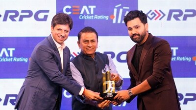 Former Indian cricketer Sunil Gavaskar, center, presents a Memento for Winning Champions Trophy 2025 to cricketer Rohit Sharma, right (PTI) Former Indian cricketer Sunil Gavaskar, center, presents a Memento for Winning Champions Trophy 2025 to cricketer Rohit Sharma, right (PTI)