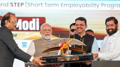 In this image received on Oct. 8, 2025, Prime Minister Narendra Modi with Maharashtra Chief Minister Devendra Fadnavis and Deputy Chief Ministers Ajit Pawar and Eknath Shinde during the inauguration of Phase 1 of the Navi Mumbai International Airport and launch of other development projects, in Navi Mumbai, Maharashtra. (PMO via PTI Photo) (PMO) In this image received on Oct. 8, 2025, Prime Minister Narendra Modi with Maharashtra Chief Minister Devendra Fadnavis and Deputy Chief Ministers Ajit Pawar and Eknath Shinde during the inauguration of Phase 1 of the Navi Mumbai International Airport and launch of other development projects, in Navi Mumbai, Maharashtra. (PMO via PTI Photo) (PMO)