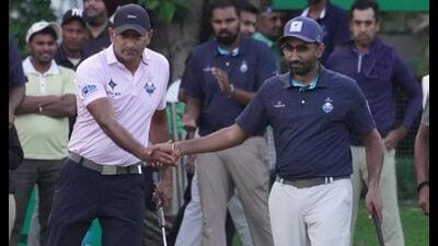 Players Girish and Kabir during the match. (HT) Players Girish and Kabir during the match. (HT)