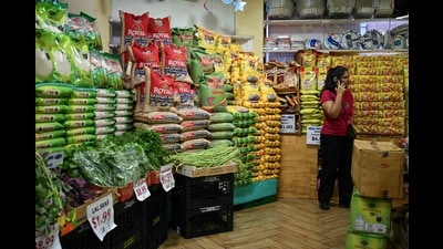 The downward revision in the next fiscal year’s forecast is on account of the 50% tariffs imposed by the US, which accounts for one-fifth of India’s merchandise exports. (AFP) The downward revision in the next fiscal year’s forecast is on account of the 50% tariffs imposed by the US, which accounts for one-fifth of India’s merchandise exports. (AFP)