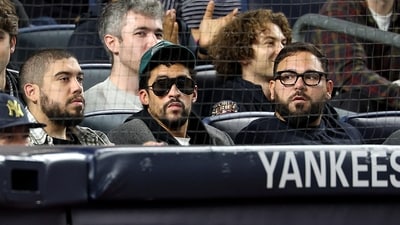 Bad Bunny attends the game between the New York Yankees and the Toronto Blue Jays. (Getty Images via AFP) Bad Bunny attends the game between the New York Yankees and the Toronto Blue Jays. (Getty Images via AFP)