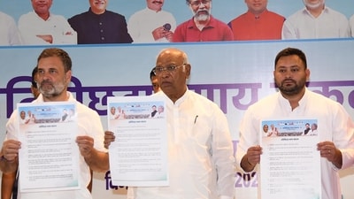 Congress party president Mallikarjun Kharge with leader of Opposition in Lok Sabha and Congress leader Rahul Gandhi and RJD leader Tejashwi Yadav (Santosh Kumar/Hindustan Times)