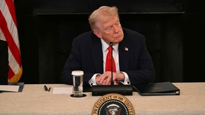 US President Donald Trump attends a roundtable about Antifa in the State Dining Room of the White House in Washington (AFP) US President Donald Trump attends a roundtable about Antifa in the State Dining Room of the White House in Washington (AFP)