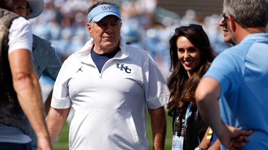 Head coach Bill Belichick of the North Carolina Tar Heels and Jordon Hudson look on prior to the game against the Richmond Spiders (Getty Images via AFP)