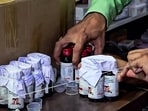 Chhindwara, Oct 5 (ANI): The Drugs Department sealing the Coldrif cough syrup containers after 10 children allegedly die due to consuming it during raid in an Ayush firm, in Chhindwara on Sunday. (ANI Video Grab).
Chhindwara, Oct 5 (ANI): The Drugs Department sealing the Coldrif cough syrup containers after 10 children allegedly die due to consuming it during raid in an Ayush firm, in Chhindwara on Sunday. (ANI Video Grab).