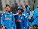India captain Harmanpreet Kaur and teammates leave the field after their loss in the ICC Women's Cricket World Cup match against South Africa at Visakhapatnam. (AP) India captain Harmanpreet Kaur and teammates leave the field after their loss in the ICC Women's Cricket World Cup match against South Africa at Visakhapatnam. (AP)