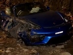 An accident occurred on the Western Express Highway in Mumbai late last night after a Porsche car allegedly collided with a divider while racing a BMW car. An accident occurred on the Western Express Highway in Mumbai late last night after a Porsche car allegedly collided with a divider while racing a BMW car.