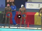 Indian swimmers wearing trunks with Indian flag