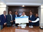 Chief Minister Pushkar Singh Dhami receiving a <span class='webrupee'>₹</span>5 crore cheque for the Chief Minister’s Relief Fund from representatives of Larsen & Toubro in New Delhi. Chief Minister Pushkar Singh Dhami receiving a <span class='webrupee'>₹</span>5 crore cheque for the Chief Minister’s Relief Fund from representatives of Larsen & Toubro in New Delhi.