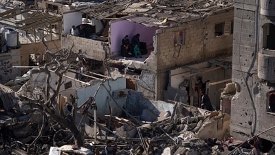 People look at the destruction after an Israeli strike on residential buildings and a mosque in Rafah, Gaza Strip (Fatima Shbair/AP) People look at the destruction after an Israeli strike on residential buildings and a mosque in Rafah, Gaza Strip (Fatima Shbair/AP)