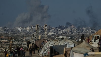 Smoke rises following an Israeli military strike in Gaza City in October 2025. (AP) Smoke rises following an Israeli military strike in Gaza City in October 2025. (AP)
